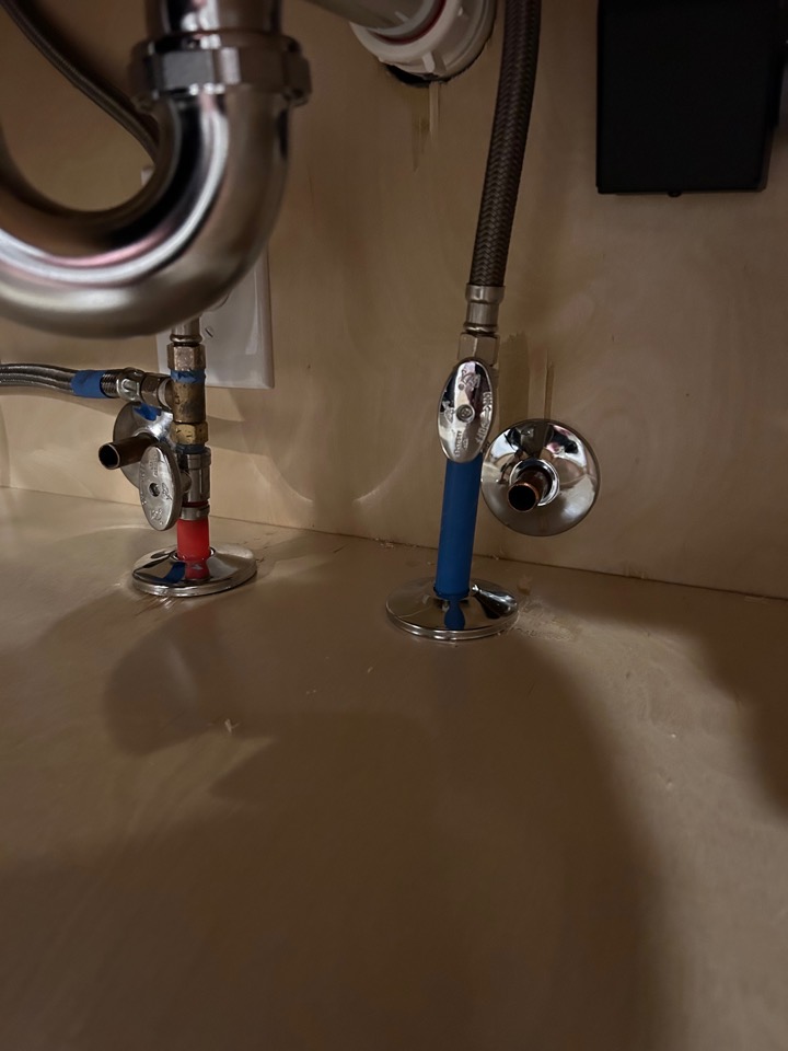 New quarter-turn shutoff valves on the hot and cold lines under a sink